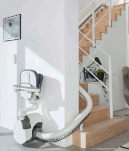 The Flow X Curved Stairlift in a 180 park position folded